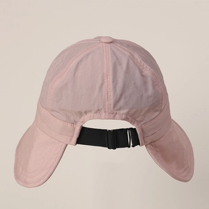 Close-up of pink nylon sun hat detailing the adjustable black strap and neck flap fabric