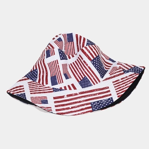 Detail view of double-sided bucket hat with vintage American flag print on canvas fabric
