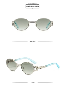 Detail view of silver steampunk sunglasses with blue-green gradient lenses and lightning temple