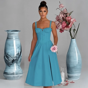 Sky blue corset midi dress with lace-up straps and side slit detail shown on model