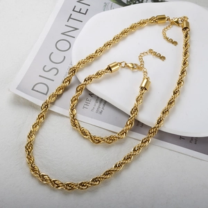 Detailed close-up of 18K gold-plated stainless steel rope chain necklace and bracelet set