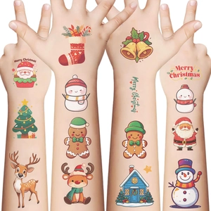 Close-up of colorful Christmas temporary tattoos featuring Santa, reindeer and snowmen