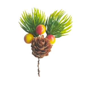 Artificial Christmas pine needles with pine cone and red berries on a branch decoration