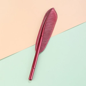 Elegant metallic rose red quill pen with detailed feather texture and matching cap