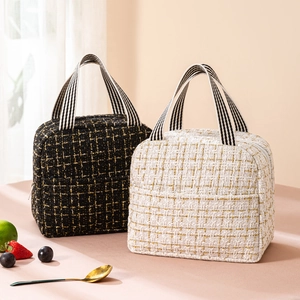 Tweed insulated lunch bag set in black and white with gold accents and striped handles
