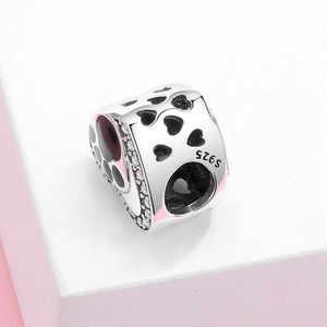 S925 sterling silver paw print charm with pink enamel and cubic zirconia stones