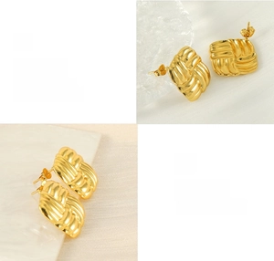 Detail showing the polished 18K gold-plated braided texture on square stud earrings