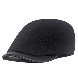 Detail of wool blend vintage beret with premium leather brim and stitching
