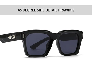 Close-up of square sunglasses with thick black frame and silver arrow-shaped metal detail
