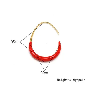 Detailed size view of red enamel and 18K gold U-shape earrings, 30mm x 22mm