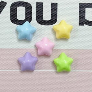 Macro detail of colorful macaron star resin charms for DIY jewelry and phone cases