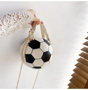 Creative soccer shaped crossbody bag with black and white finish and golden chain strap
