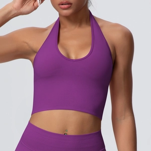 Detail of purple halter-neck sports bra in ribbed fabric with high elasticity
