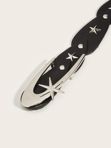 Close-up of black leather belt featuring silver metal stars and a vintage buckle detail