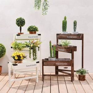 Three-tier rustic wood plant stand in white and dark brown with Home & Garden printing