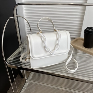 Minimalist white leather crossbody square bag with chunky chain strap and top handle