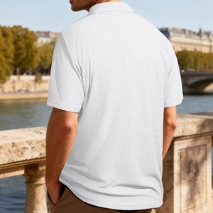 Men's white textured knit short sleeve polo shirt with zipper placket in a casual fit