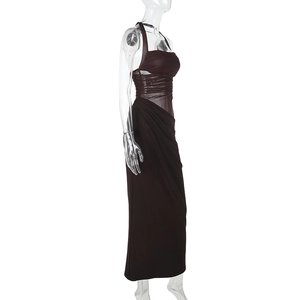 Detail of ruched dark brown halter dress featuring mesh patchwork and side pleats