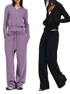 Women's soft loungewear set featuring zip-up hoodies and drawstring wide-leg pants