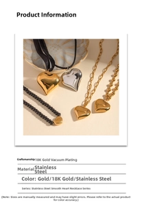 Macro detail of 18K gold plated heart pendant necklace with smooth polished finish