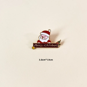 Detail showing a 3.0cm Santa Claus brooch with Merry Christmas text on cream leather