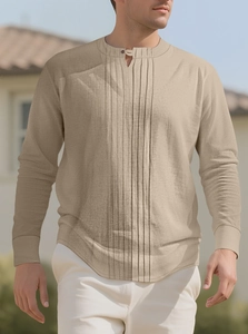 Close-up of pleated linen fabric texture and buttoned Henley collar on men shirt