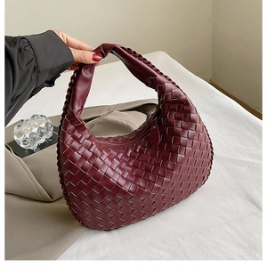 Chic burgundy woven PU leather hobo handbag with a minimalist half-moon silhouette design