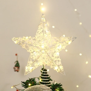 Lighted star tree topper with warm yellow LED lights and fluffy white snow texture decor