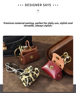 Detail of vintage leather coin purse keychains in brown and leopard print textures