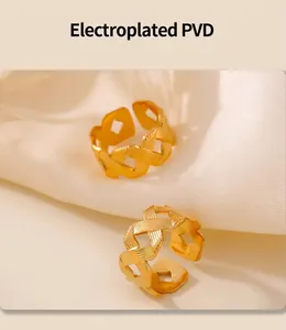 Detail of twisted texture on gold plated rings with electroplated PVD finish on silk