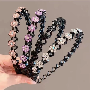 Elegant wavy floral headband with sparkling rhinestones in pink purple and black colors
