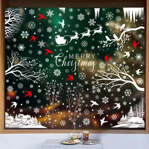 Window display of Christmas deer and snowflake static stickers with Merry Christmas text