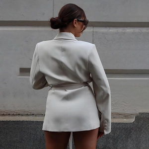 Elegant long sleeve white blazer dress with waist belt and button cuffs in a slim fit style