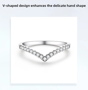 Detail of V-shaped sterling silver ring with sparkling pave stones and claw setting