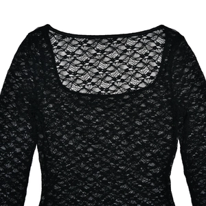 Close-up of black floral lace top neckline showing detailed mesh fabric patterns