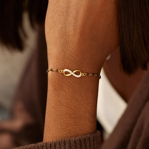 Minimalist s925 silver infinity bracelet with white zircon and black beads for women