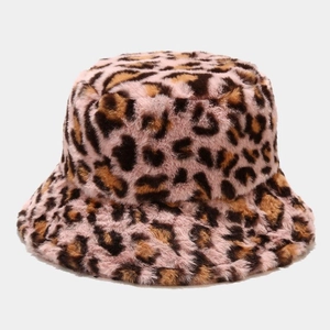 Detailed view of soft leopard print faux fur bucket hat in pink for winter warmth