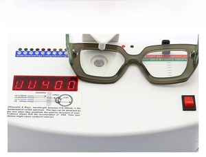 Detailed UV400 protection test showing olive green eyewear blocking UV rays on tester