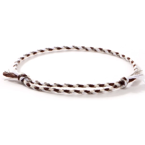 Handmade bohemian braided friendship bracelet in white, brown and grey tones for summer beach