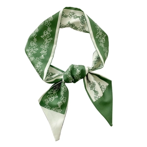 Green and white floral silk scarf hair band with elegant floral pattern on white background