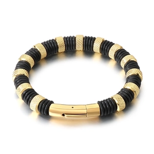Men's stainless steel black rubber bracelet with gold knurled beads and safety clasp