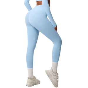 Light blue high waisted yoga pants with seamless shaping and lifting for fitness