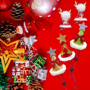 Detailed Christmas pet hats with reindeer antlers and lace bells on festive red background
