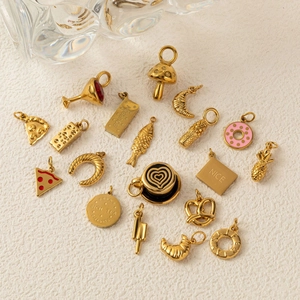 Assortment of 18K gold plated stainless steel food charms including pizza and croissant
