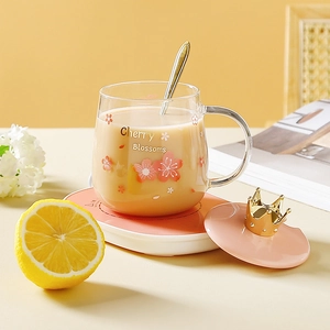 Borosilicate glass cherry blossom mug set with pink heating coaster and crown lid