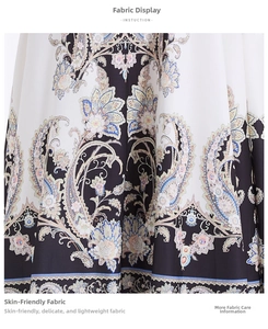 Détail du tissu à imprimé floral paisley doux avec un drapé délicat et une texture fine