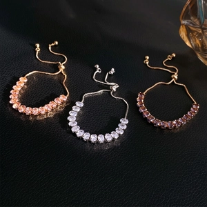 Adjustable zircon bracelet with oval crystals in rose gold, silver, and gold finishes