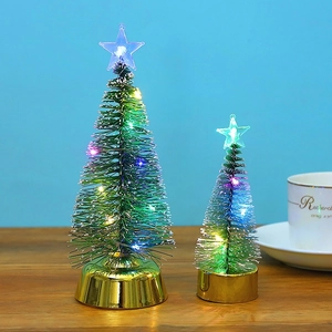 Two-piece colorful glowing Christmas cedar trees with gold bases and LED star toppers