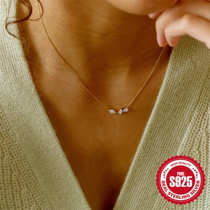 Chic S925 sterling silver gold plated necklace with clustered diamond leaf pendant for women