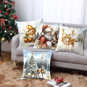 Christmas pillow covers set with Santa Snowman Reindeer designs on a gray sofa